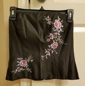 Embroidered satin bridal top.